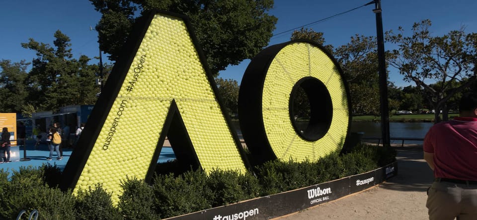 The Australian Open logo, comprising the letters 'A' and 'O', constructed from yellow tennis balls.